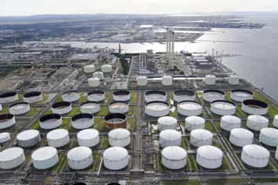 Image for Oil edges higher on lower U.S. crude stocks, cautious outlook