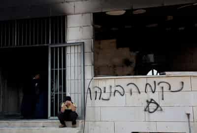 Image for Israeli settlers set fire to West Bank mosques after deadly clash
