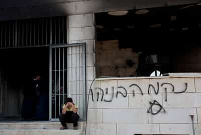 Image for Israeli settlers set fire to West Bank mosques after deadly clash