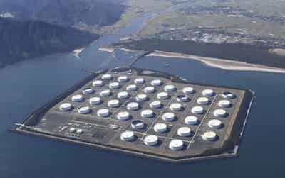 Image for Oil up as market weighs supply cuts against gloomy economic outlook