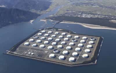 Image for Oil up as market weighs supply cuts against gloomy economic outlook