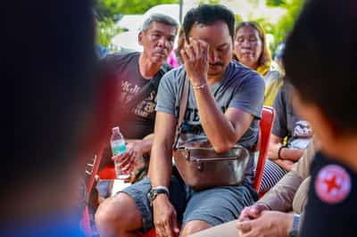 Image for Thai man mourns wife and children killed in shelling near Cambodia border