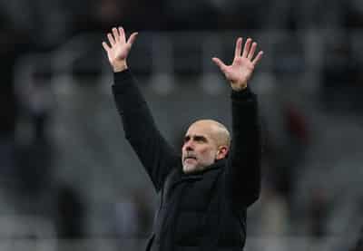 Image for Soccer-Man City's Guardiola wary of unpredictable United under new boss Carrick