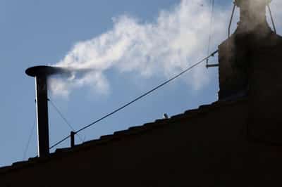 Image for White smoke billows from Sistine Chapel, signalling new pope elected