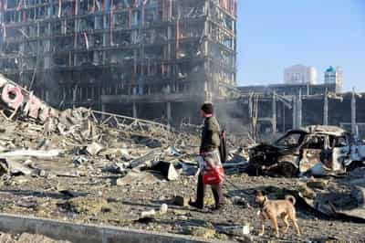 Image for At least eight dead as Kyiv shopping centre wrecked by shelling