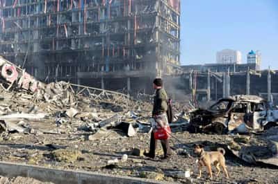 Image for At least eight dead as Kyiv shopping centre wrecked by shelling
