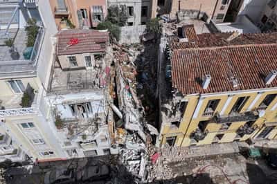 Image for One dead, 5 missing after explosion destroys building in Athens