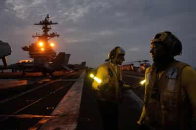 Image for Aboard the USS George Washington, young sailors adjust to war with Iran