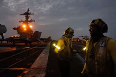 Image for Aboard the USS George Washington, young sailors adjust to war with Iran