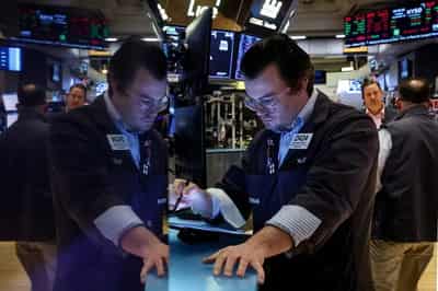 Image for US stocks tread water in thin trade, benchmark US yield backs off new high