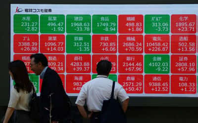 Image for Asia markets hit records on AI euphoria, Iran peace hopes