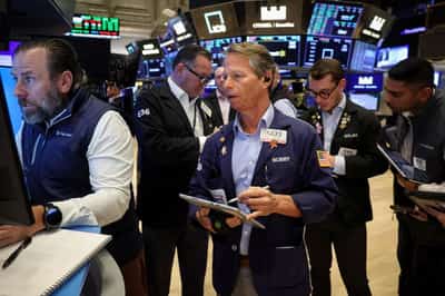 Image for Trading Day: Economic reality damps AI, deals optimism