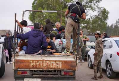 Image for Bedouin civilians leave Syria's Sweida as tense truce holds