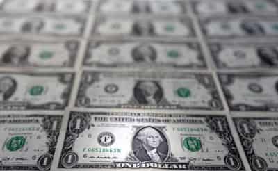 Image for Dollar boosted by safety bid on rising recession fears