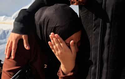 Image for Israeli strikes in Gaza kill two people, including a child, medics say