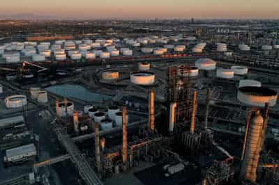 Image for Oil prices gain 2% on big US storage withdrawal, weaker US dollar