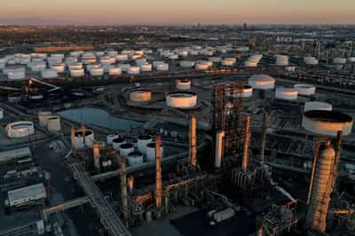 Image for Oil prices gain 2% on big US storage withdrawal, weaker US dollar