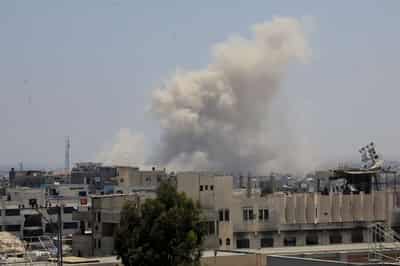 Image for Fifty killed in Gaza, many trying to reach food, as UN denounces Israeli-backed aid system