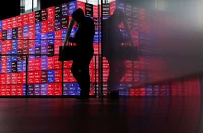 Image for Shares slip in Asia as oil climbs, rate hikes loom