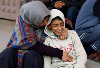 Image for Israeli fire kills 11, including journalists and children, Gaza medics say