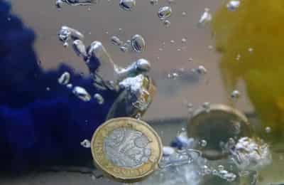 Image for Sterling falls ahead of UK budget, while volatility gauge jumps