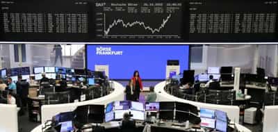Image for European stocks cut losses as ECB hikes rate as expected