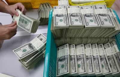 Image for Dollar touches five-month low on rate cut hopes in thin market
