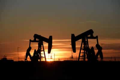Image for Oil prices gain as inventories fall and demand picks up