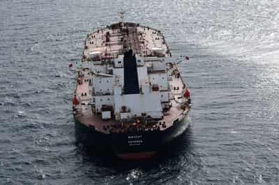Image for Oil up as investors balance sanctions risks, oversupply worries