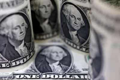 Image for Dollar slips after Powell strikes balanced tone on inflation