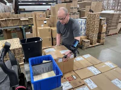 Image for Amazon’s net loss prompts query: Has it built too many warehouses?