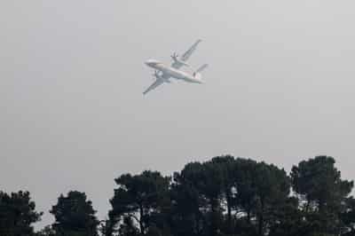 Image for Wildfire rages near Paris as heatwave scorches Europe
