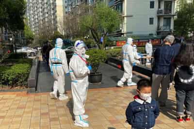 Image for Shanghai widens COVID testing as other Chinese cities impose curbs