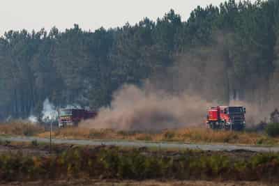 Image for Two arrested on suspicion of arson as firefighters battle blazes near Bordeaux