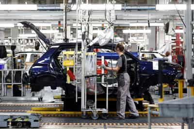 Image for Euro zone business activity returns to growth in July for first time in four months, PMI shows