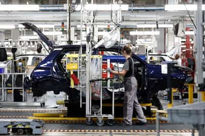 Image for Euro zone business activity returns to growth in July for first time in four months, PMI shows