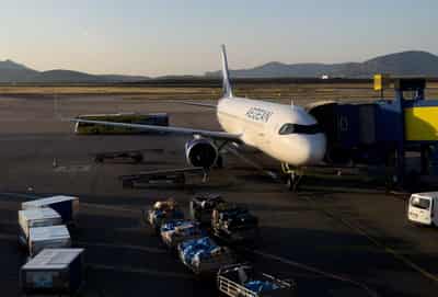 Image for Factbox-Price hikes, outlook cuts - What airlines are doing as fuel costs surge