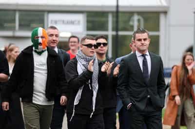 Image for UK prosecutors lose appeal to reinstate terrorism charge against Kneecap rapper