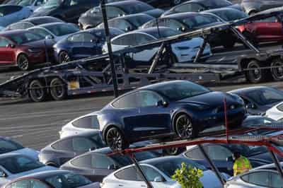Image for Tesla misses delivery estimates as factory upgrades curb production