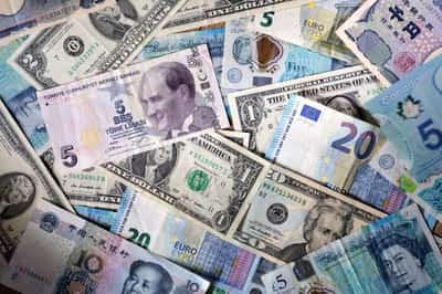 Image for Dollar rebounds from slump spurred by Powell's dovish surprise