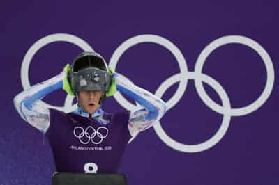 Image for Olympics-IOC 'begs' defiant Ukrainian to race without war dead helmet