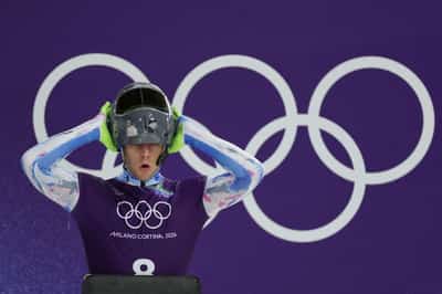 Image for Olympics-IOC 'begs' defiant Ukrainian to race without war dead helmet