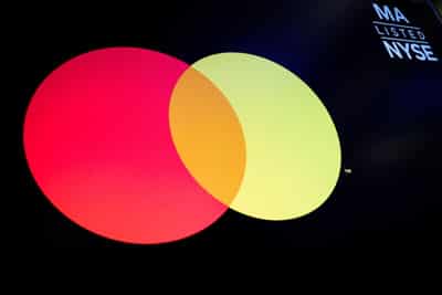 Image for Mastercard, Visa's merchant fees breach competition law, UK tribunal rules
