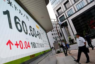 Image for Yen nears weakest in 40 years as BOJ hike fails to stem rout