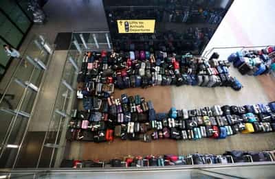Image for London’s Heathrow caps passengers at 100,000 a day