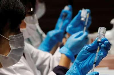 Image for Japan finds stainless steel particles in suspended doses of Moderna vaccine