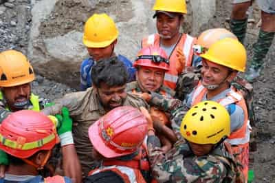 Image for Nepali foreman rescued from tunnel says he stayed behind to help others