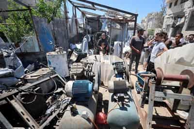 Image for Israeli attacks in Gaza kill three people, including a girl, say medics
