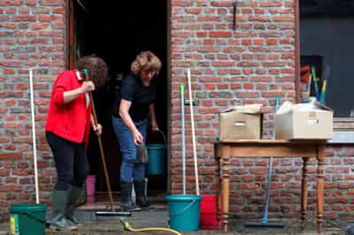 Image for Cars, pavements washed away as Belgian town hit by worst floods in decades