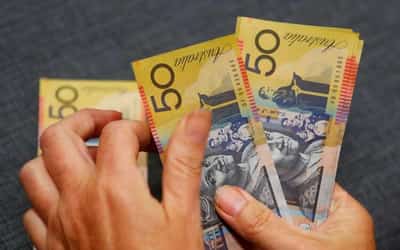 Image for Dollar steady before retail sales, Fed minutes